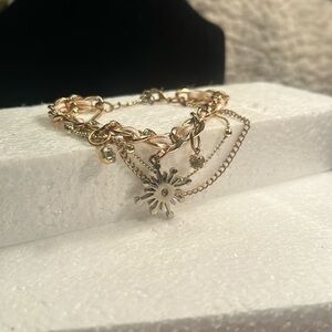 Multi-strand star and rhinestones charm bracelet